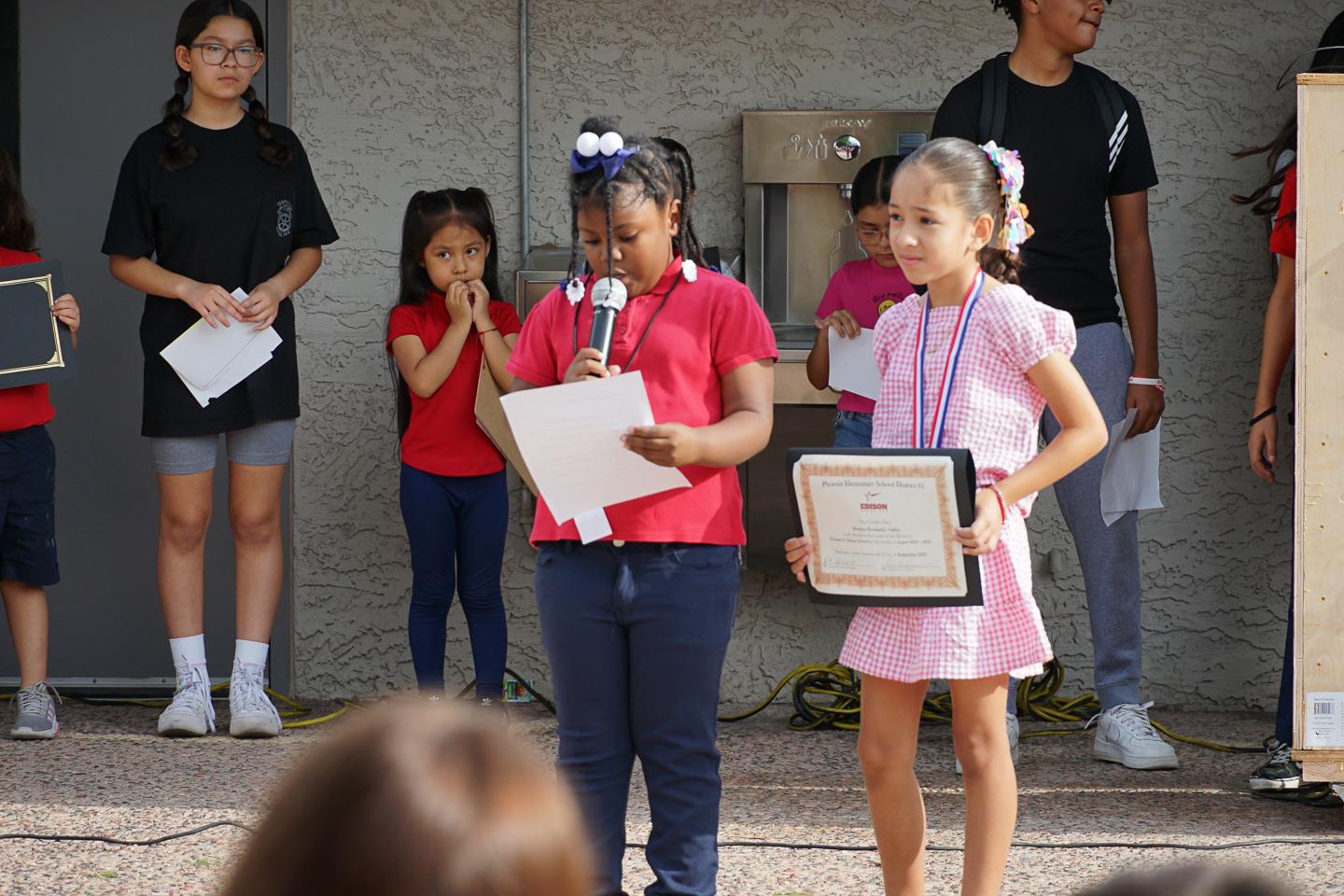 Edison Students and Staff exchange awards