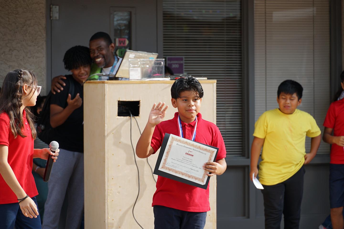 Edison Students and Staff exchange awards
