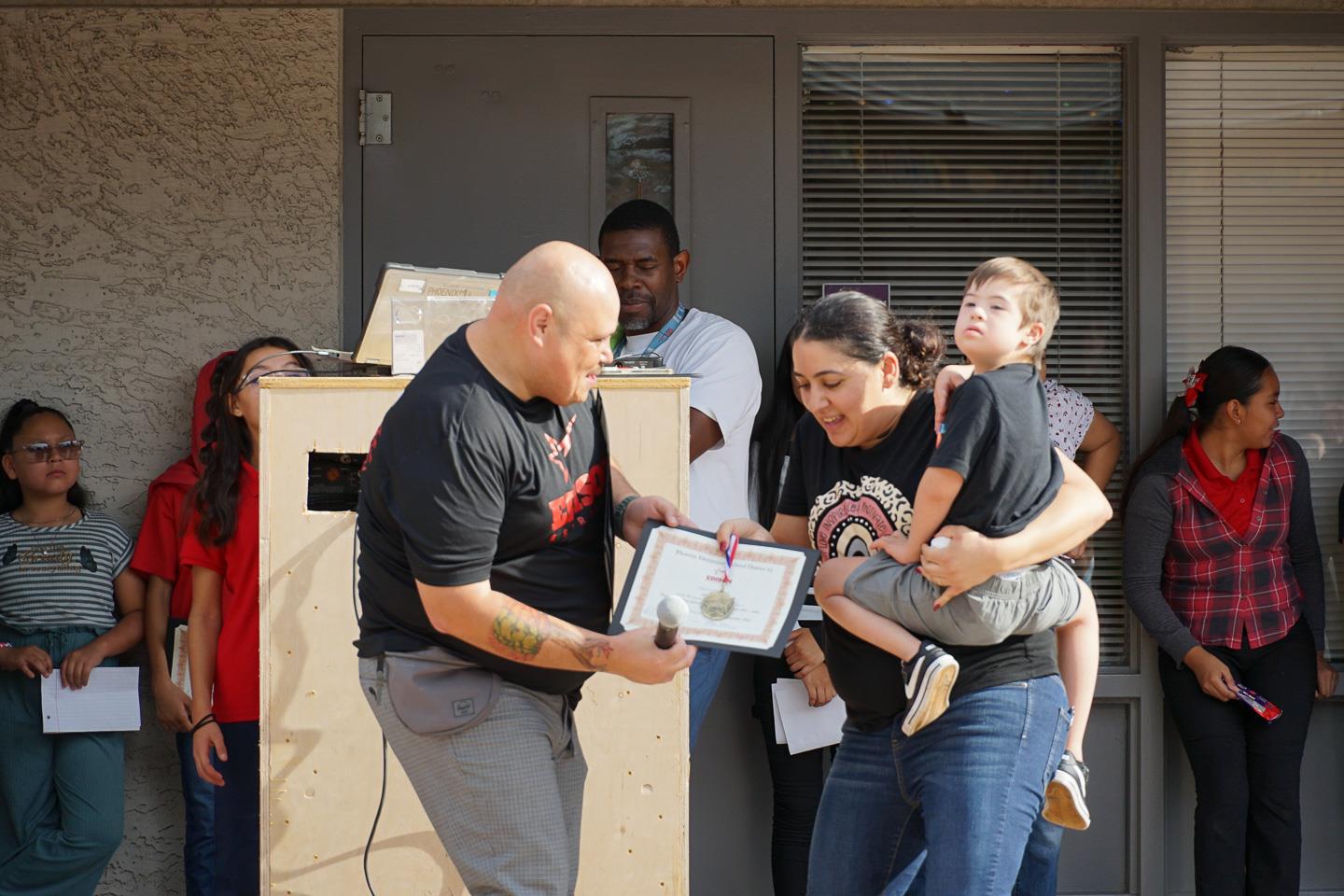 Edison Students and Staff exchange awards